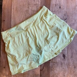 Lululemon Pace Rival skirt,mid rise, long. Sz 10 pale light yellow,muted color.